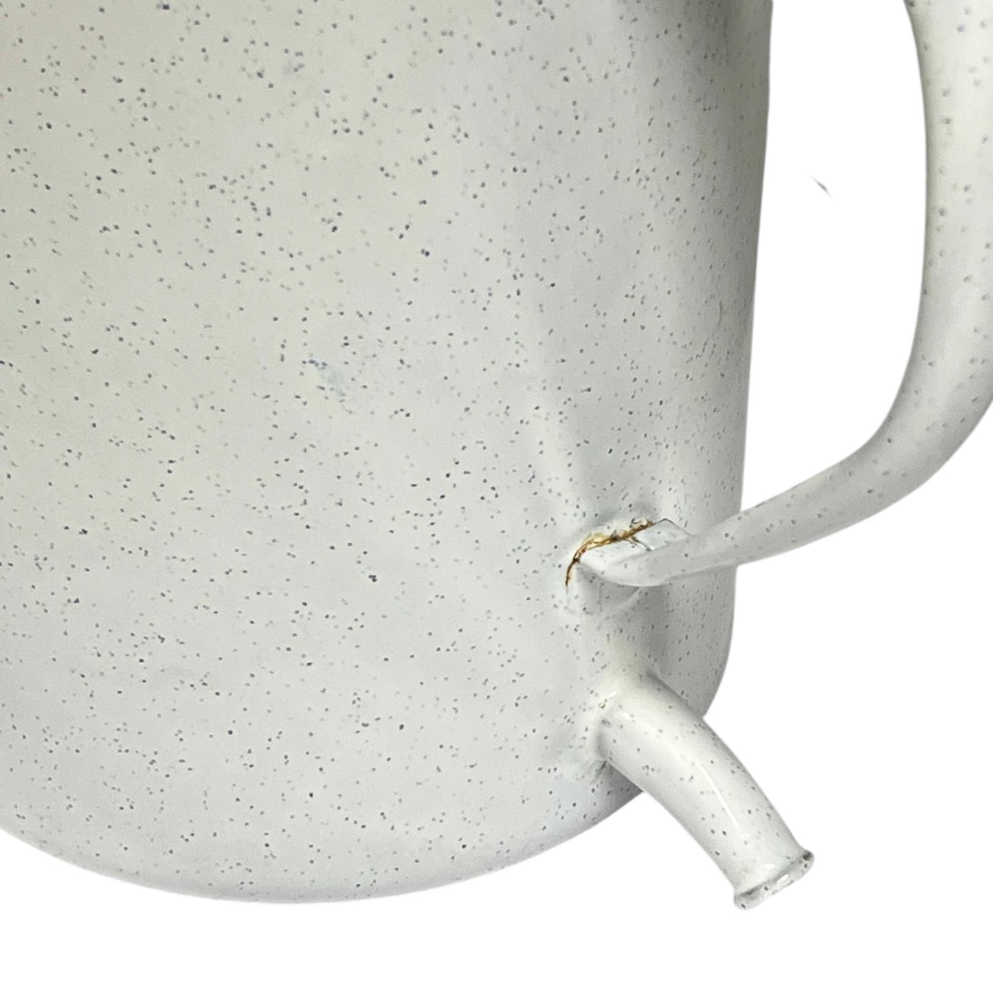 Close-up of a enamel planter with speckled pattern on a white background
