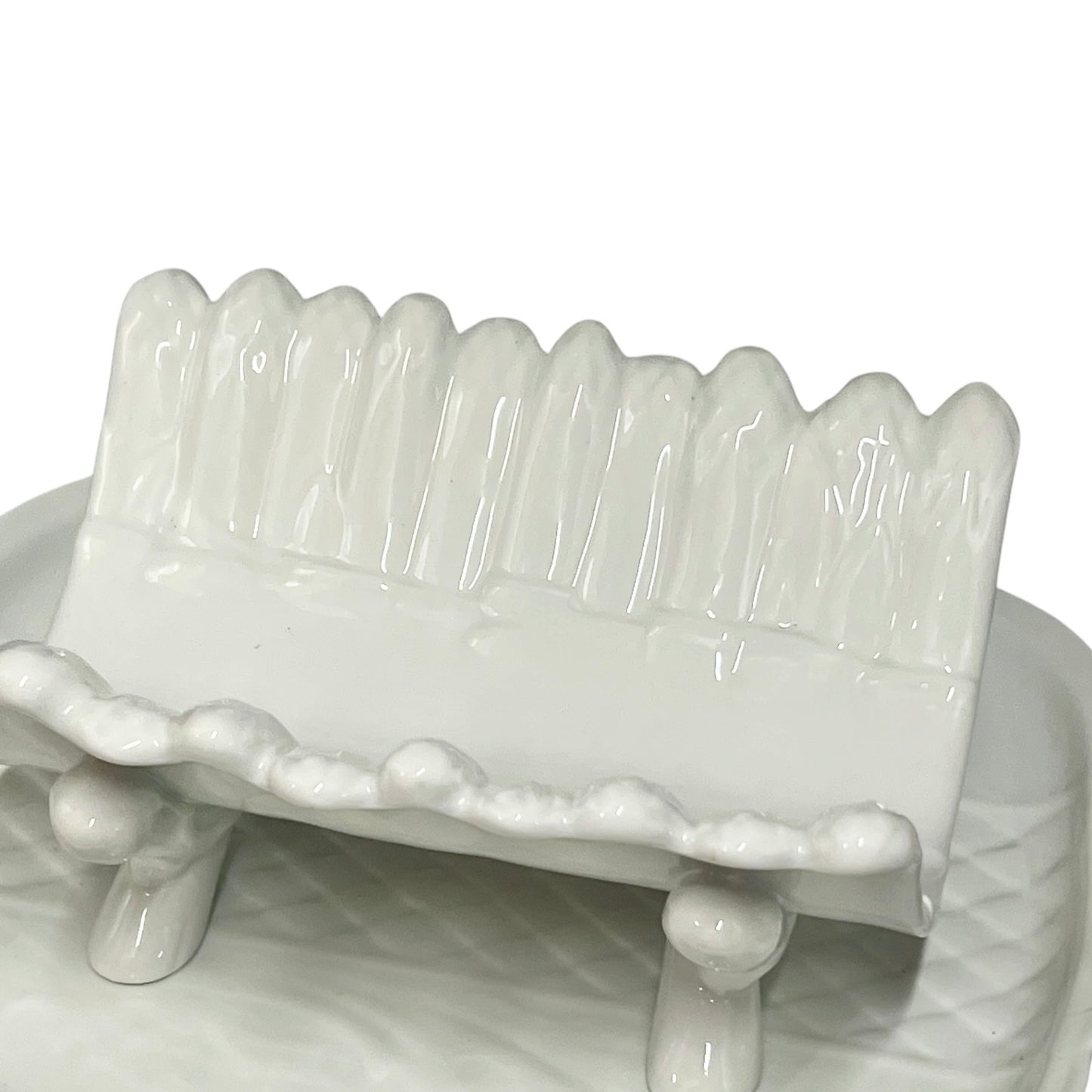close up of asparagus serving set on a white background 