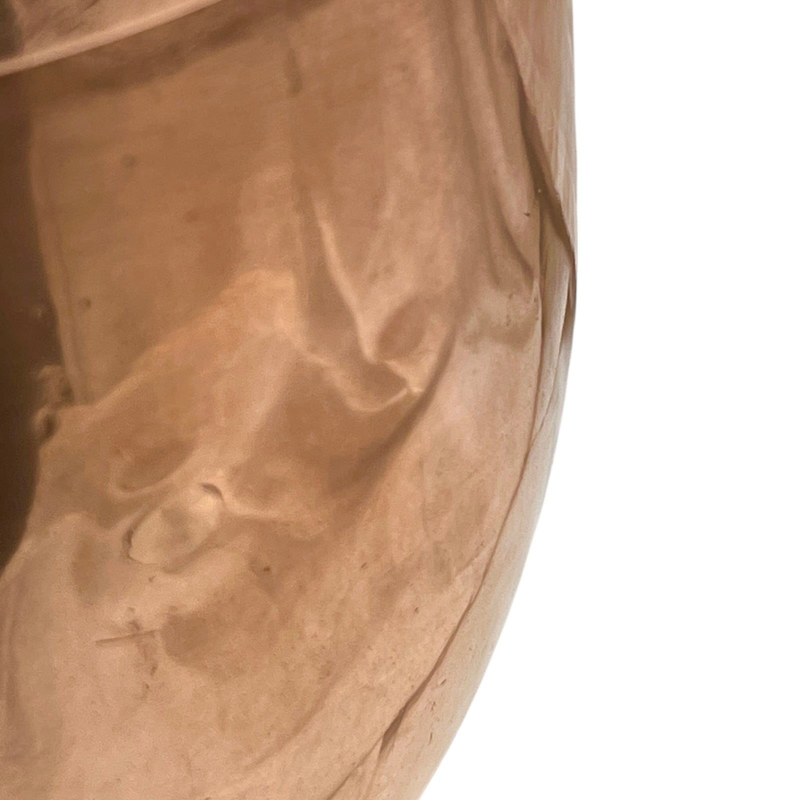 Close up of a copper cooking pot stockpot with handles on a white background