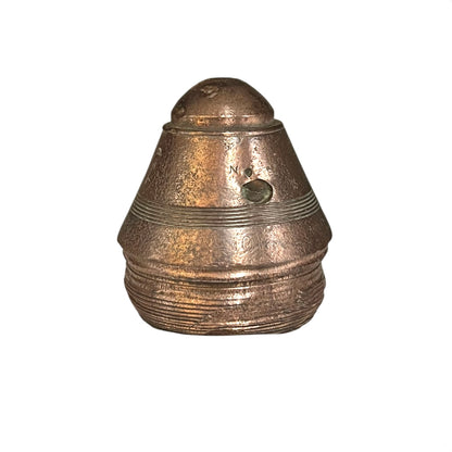 Bronze-colored metal object on a white background