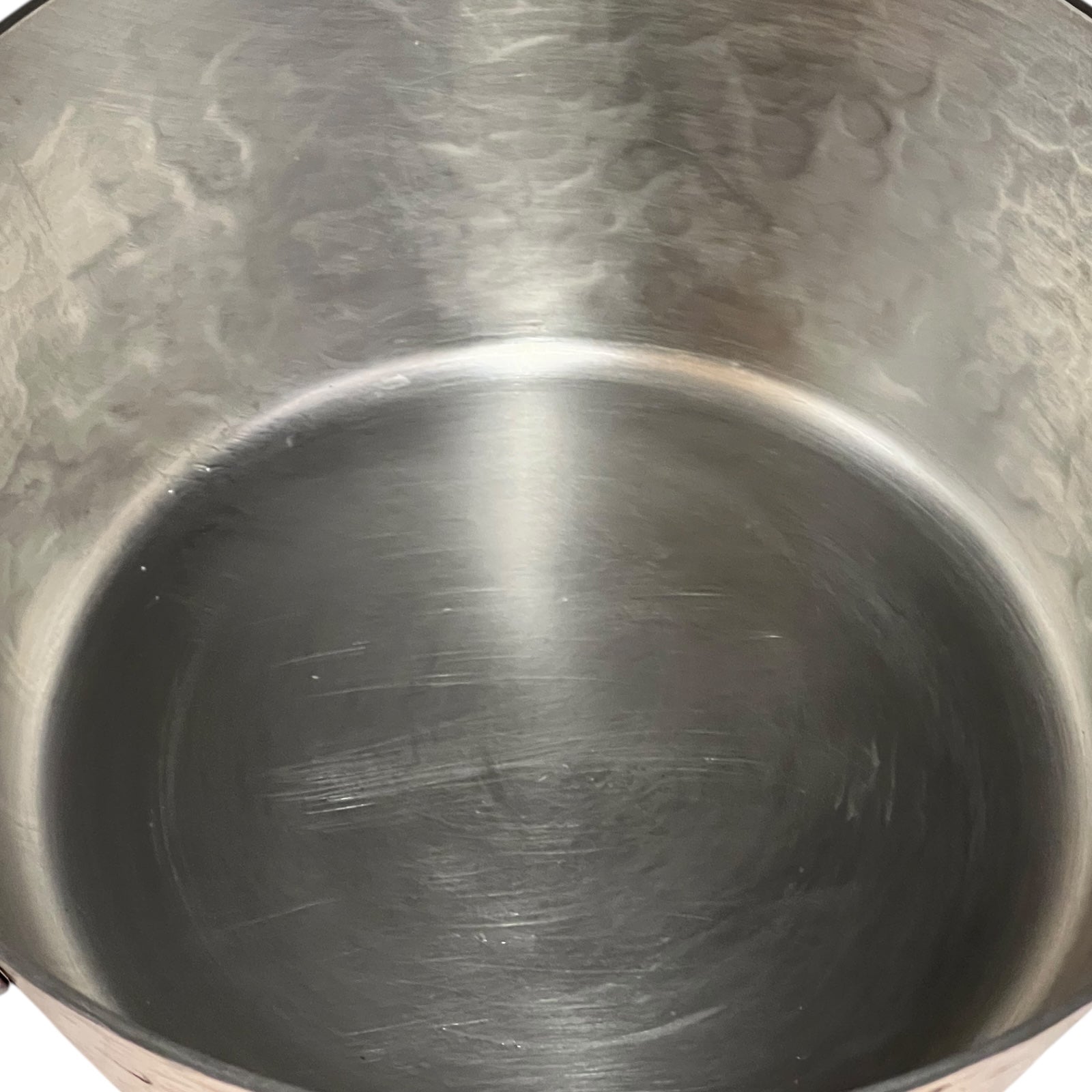 inside tin lining of copper saucepan 