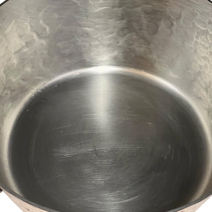 inside tin lining of copper saucepan 