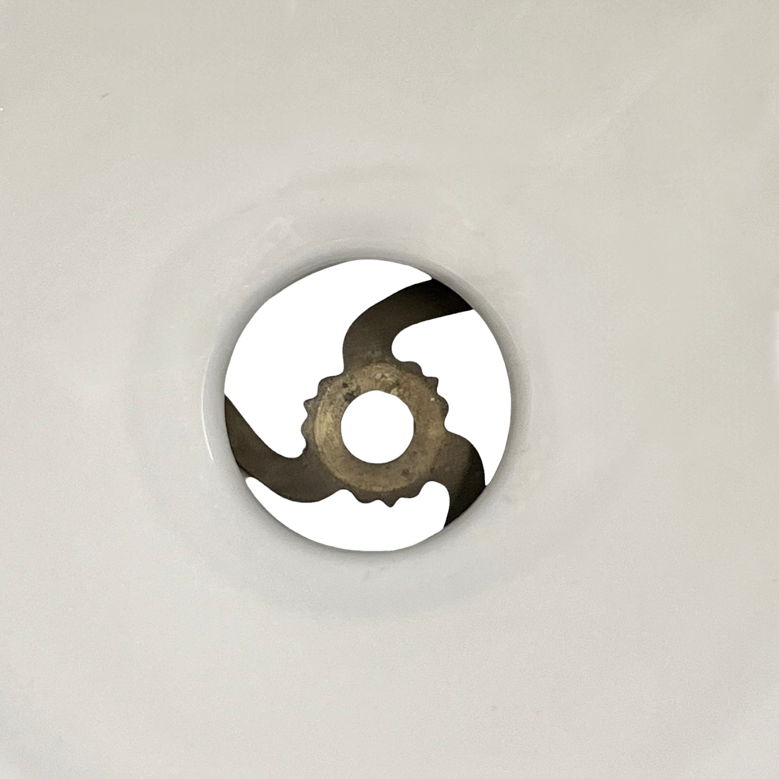 Close up of a white glass lampshade on a white background 