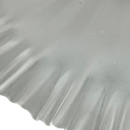 Close up of a vintage French glass lamp shade