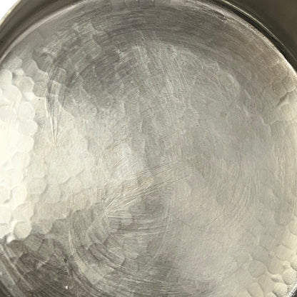 Close-up of a tin lined cooking pot