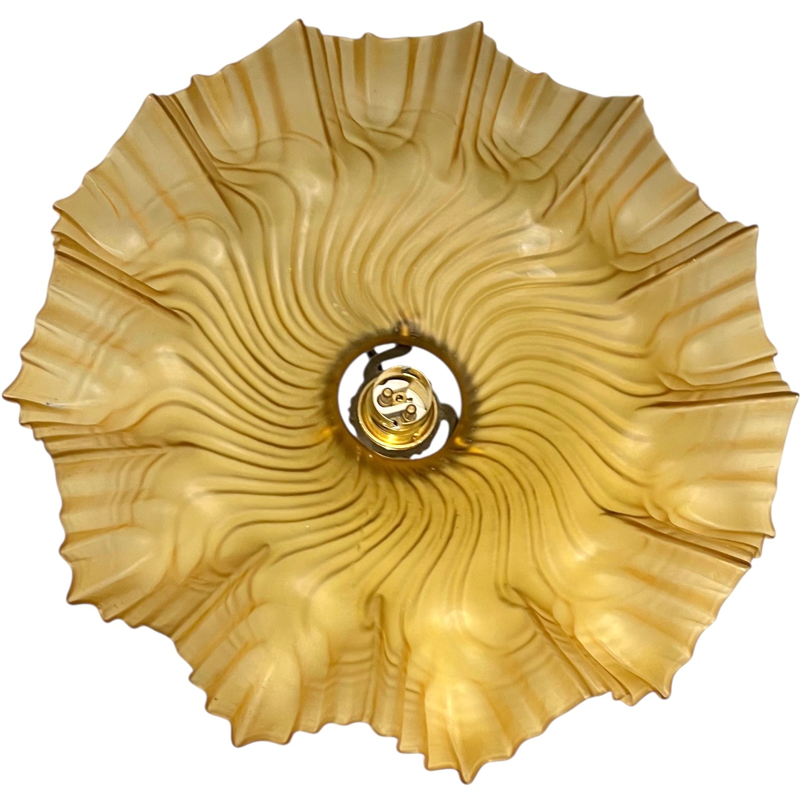 close up of amber coloured vintage French  pendant light with a scalloped design on a white background