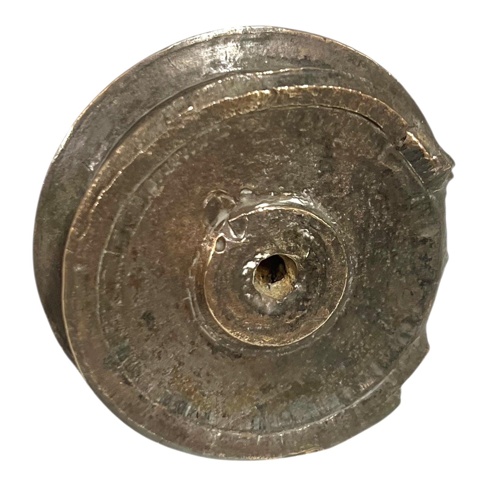 WW1 brass fuse paperweight on a white background