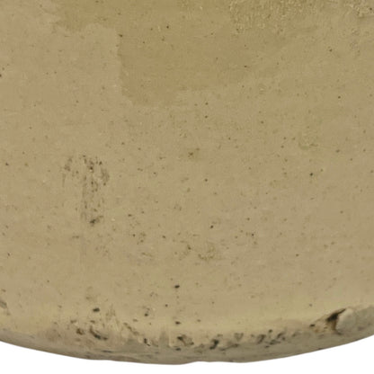 Close up of a beige cylindrical WW1 jar on a white background