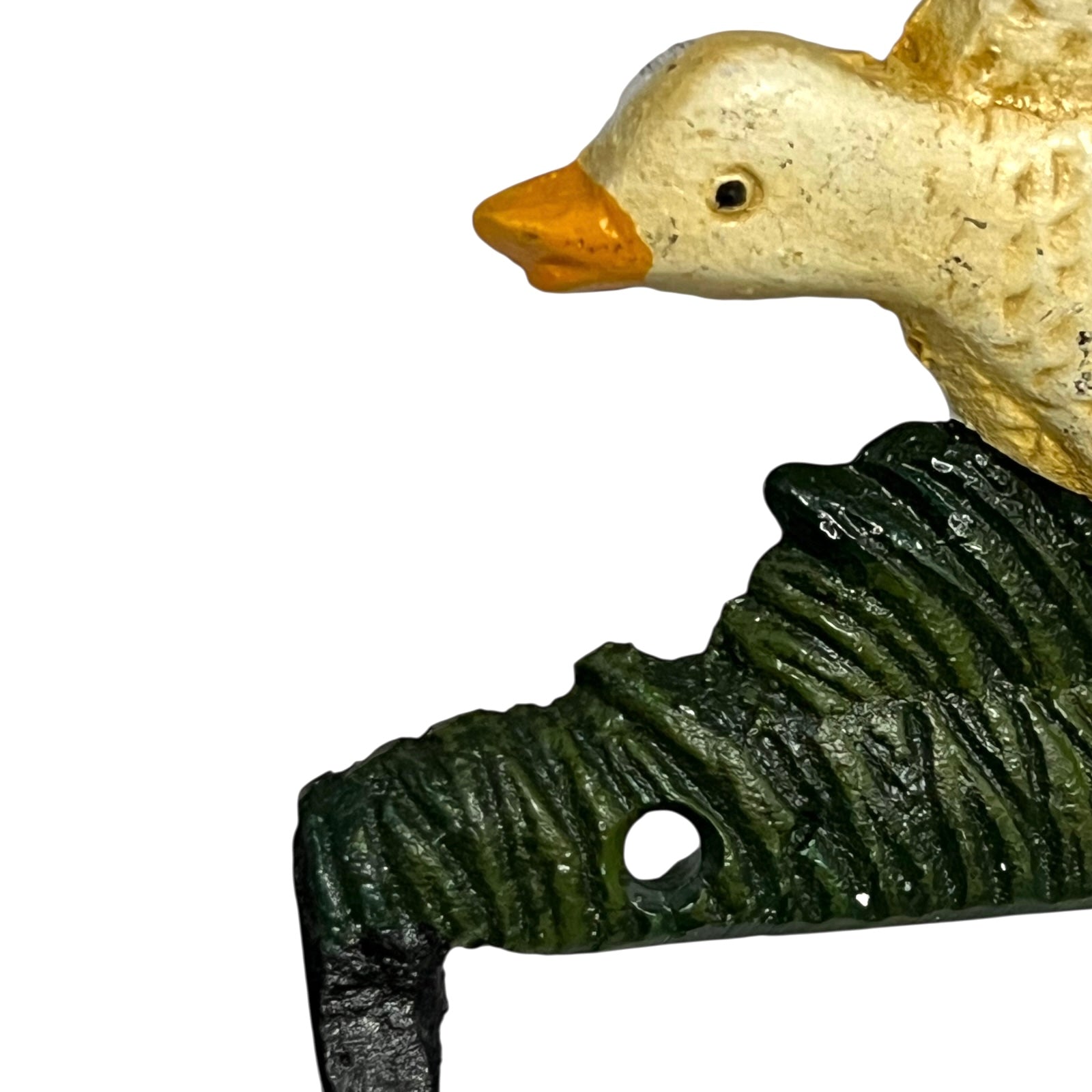 Close up of toilet roll holder with a goose design on a white background