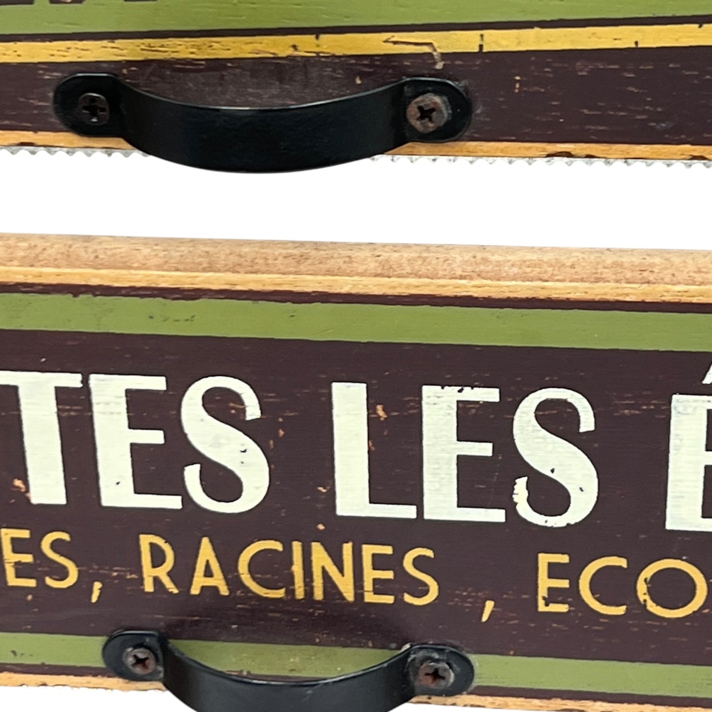close up of French paper towel dispenser on a white background