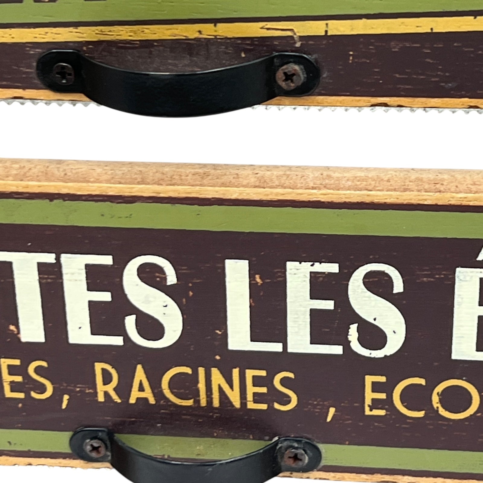 close up of French paper towel dispenser on a white background