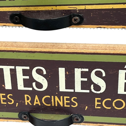 close up of French paper towel dispenser on a white background