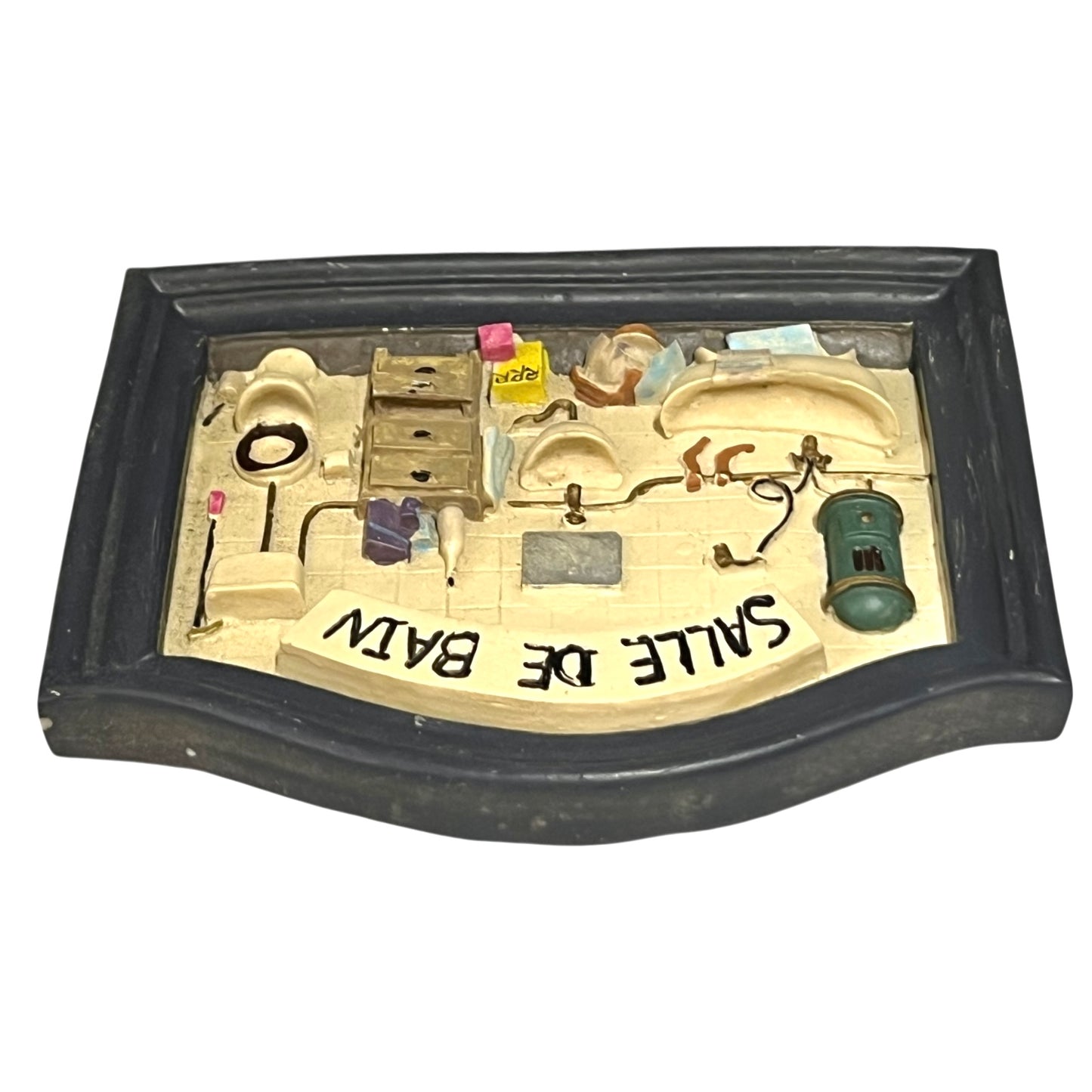 Close-up of a vintage bathroom door sign on a white background