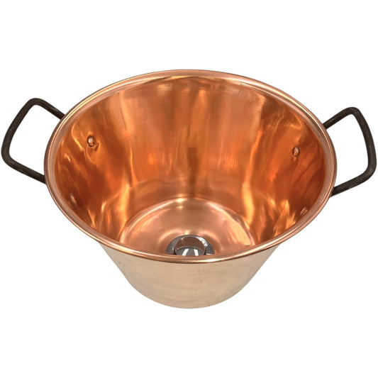Copper upcycled basin sink or washbowl with a chrome waste and black handles on a white background