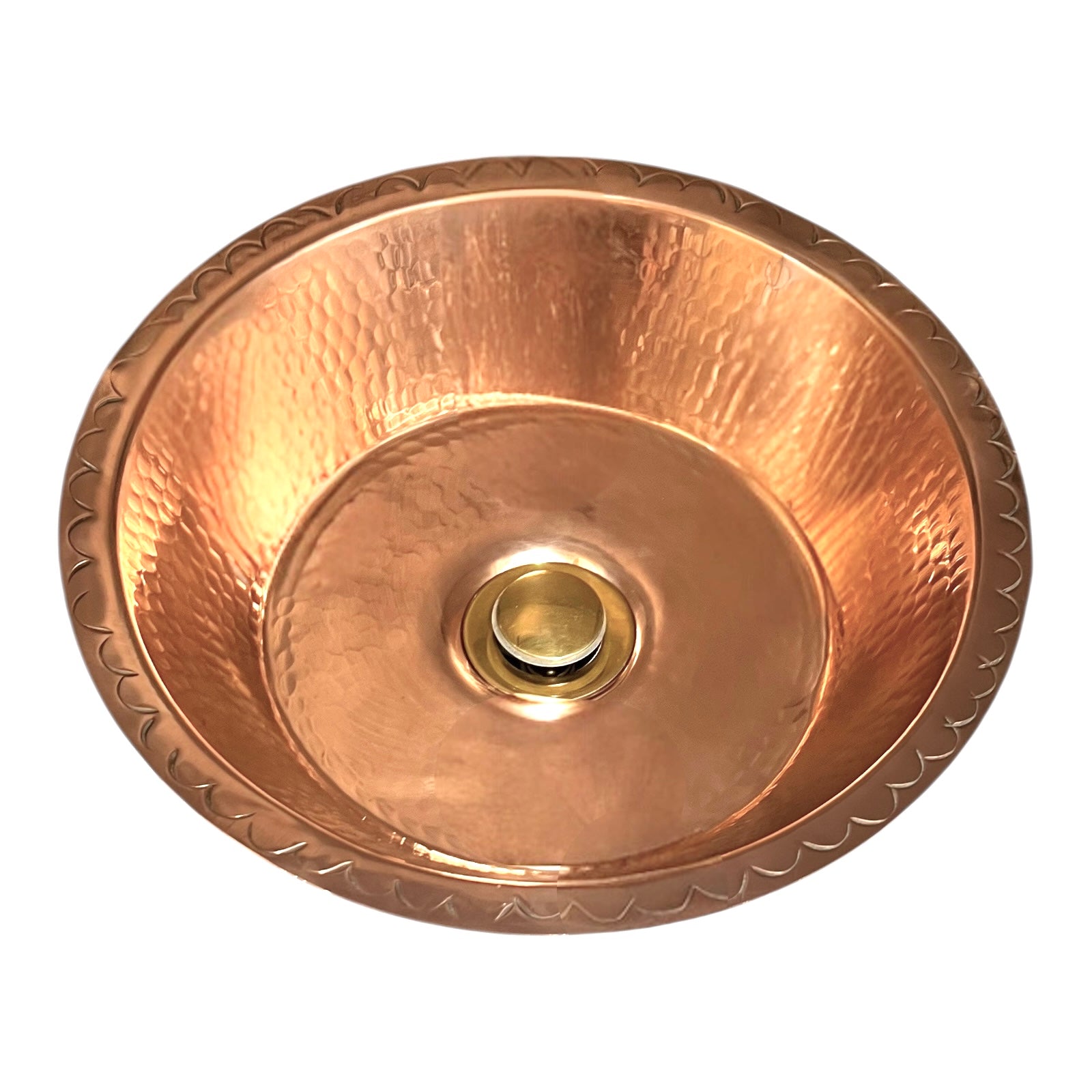 Copper sink with embossed design on a white background