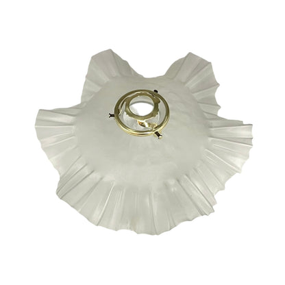 French vintage frosted glass lampshade with a frilled scalloped style edge and a brass collar on a white background