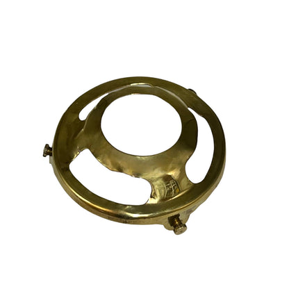 A polished brass circular metal ring with three cutouts and small side adjustment screws, shown on a plain white background.