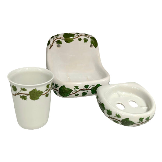 3 piece Porcelain bathroom accessory set with tumbler, toothbrush holder and soap dish featuring green leaf patterns on a white background