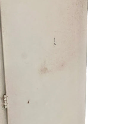 Close-up of a bathroom cabinet.