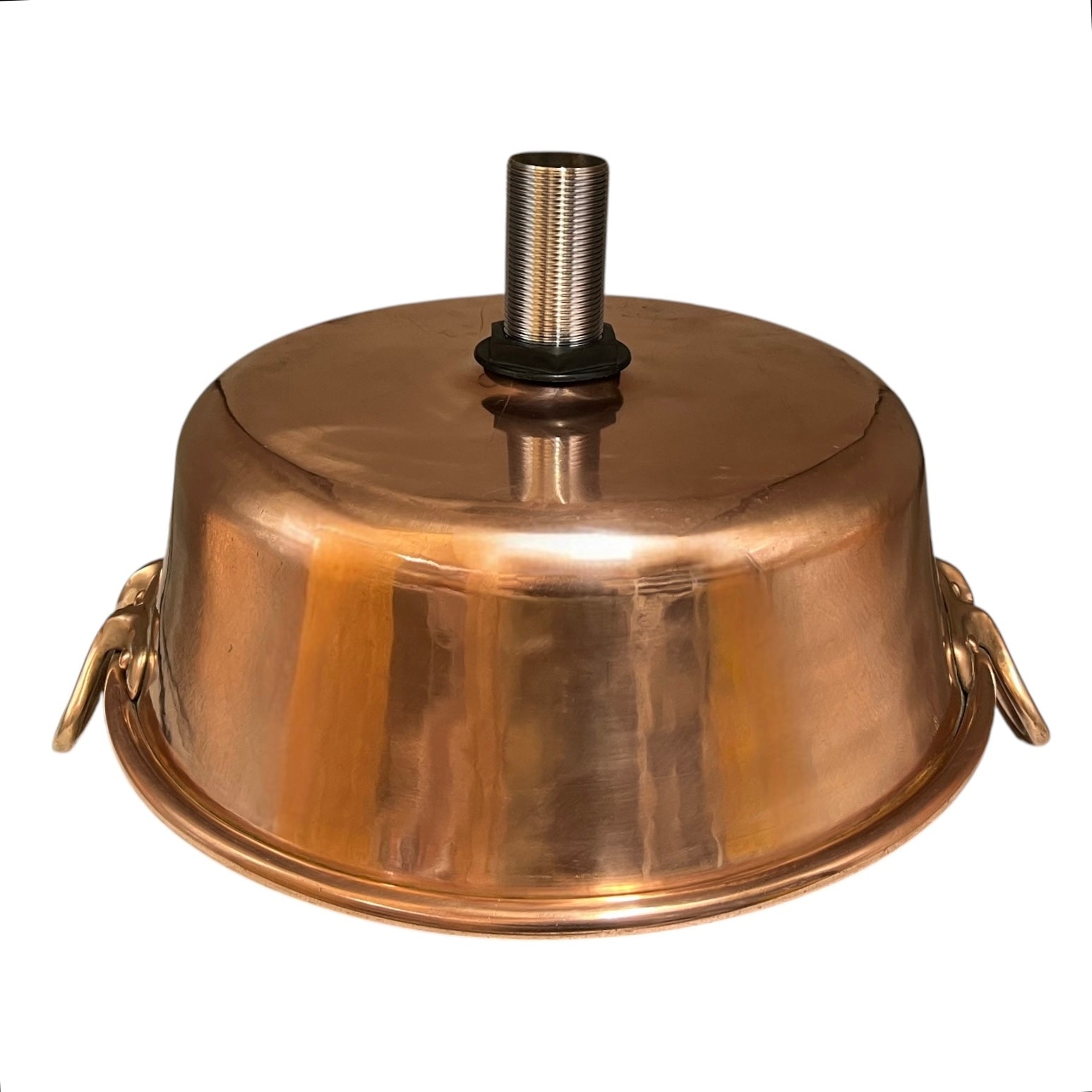 A copper-colored metal dome-shaped container or cover with a threaded vertical post on top and side handles, shown on a plain white background.