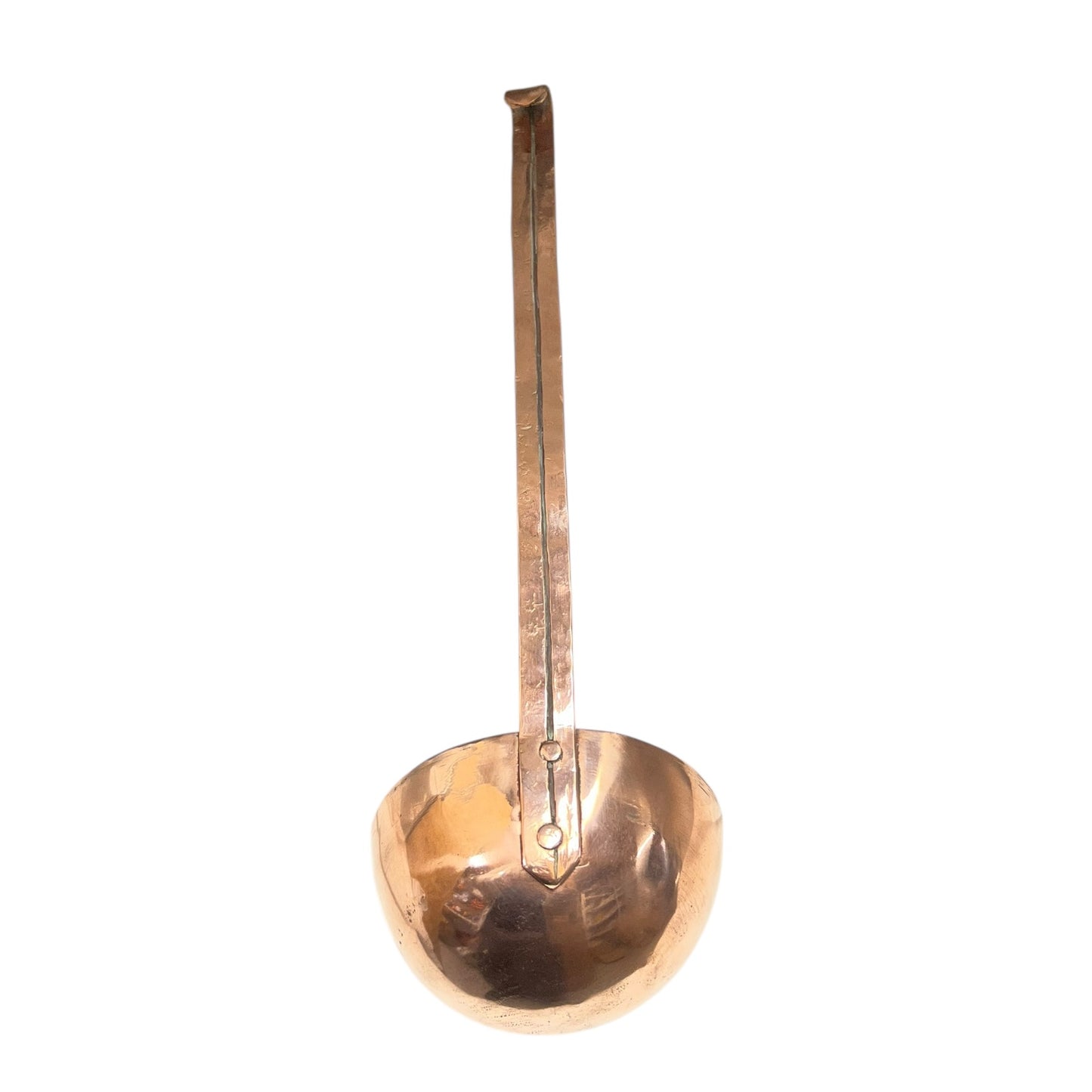 Close up of a French copper handmade ladle on a white background