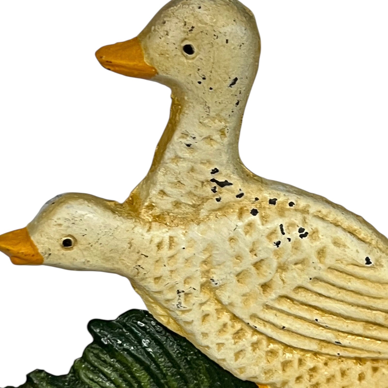 Close up of toilet roll holder with a goose design on a white background