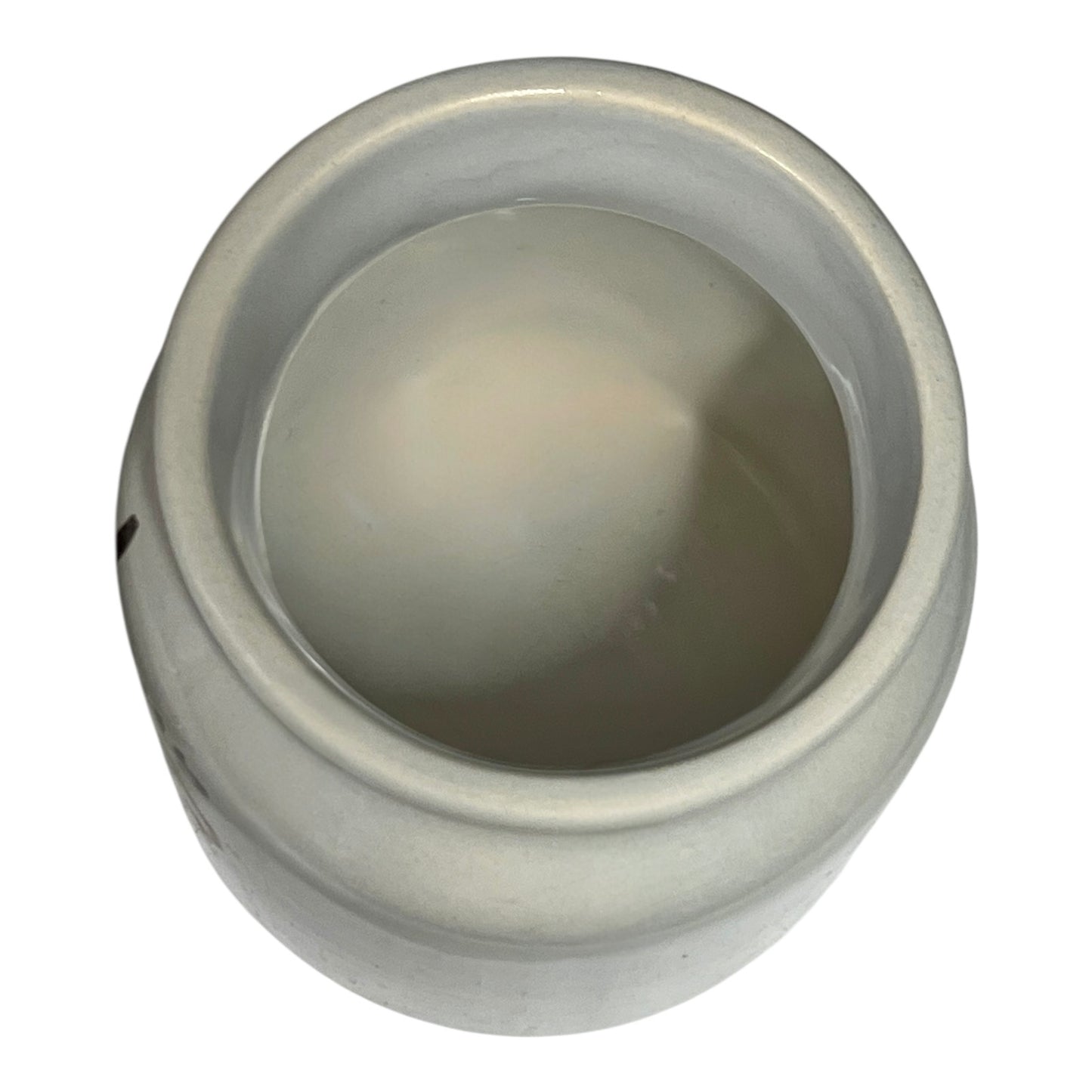 White ceramic pot on a white background