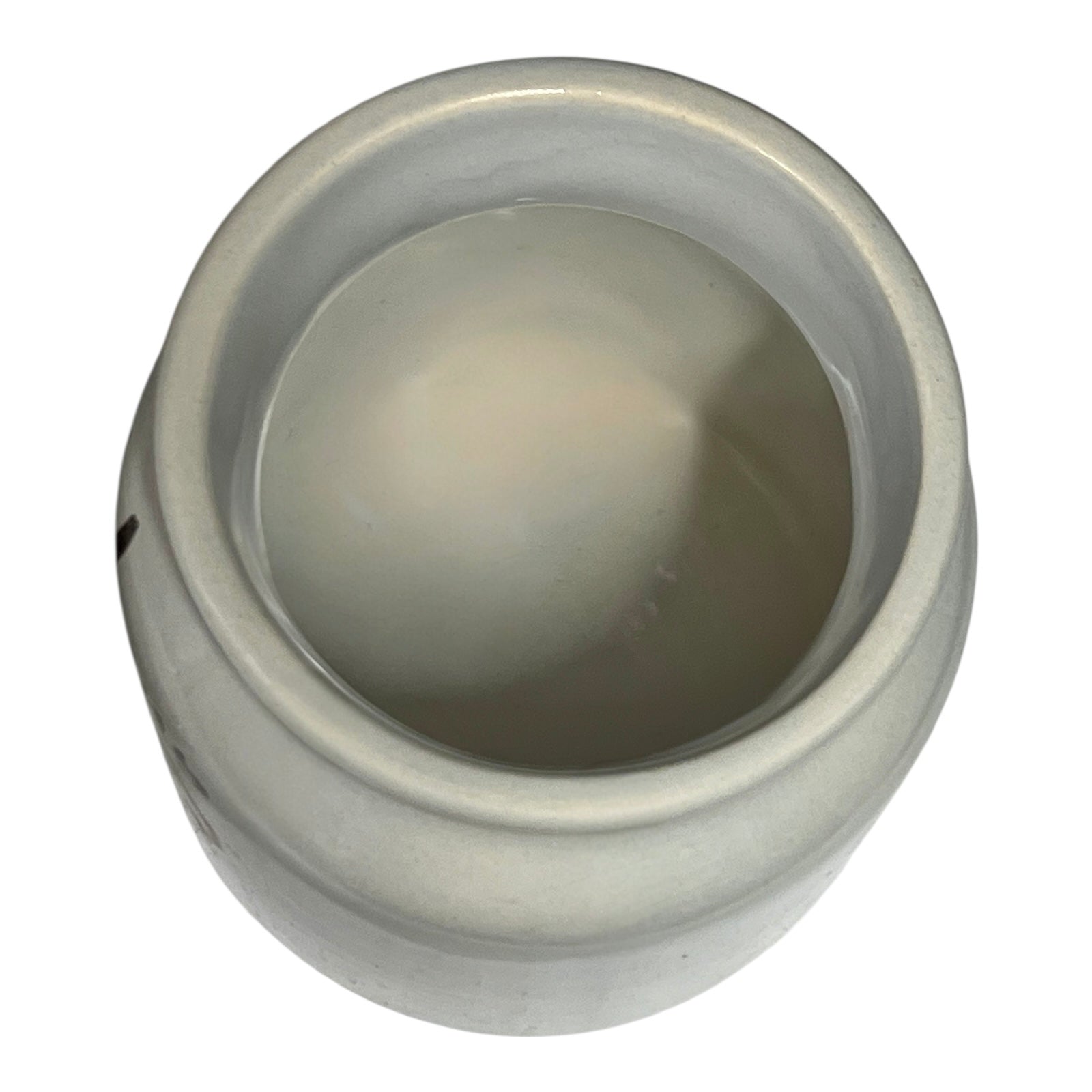 White ceramic pot on a white background