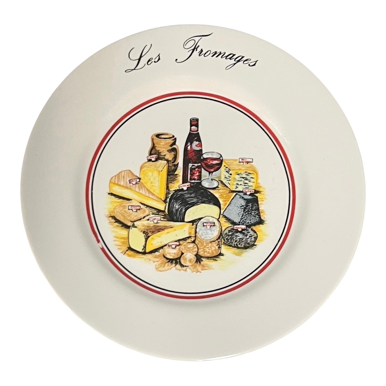 Decorative plate with illustrations of cheeses and wine, labeled 'Les Fromages'.