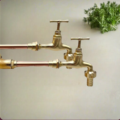 Pair of copper and brass wall mounted kitchen or bathroom taps 