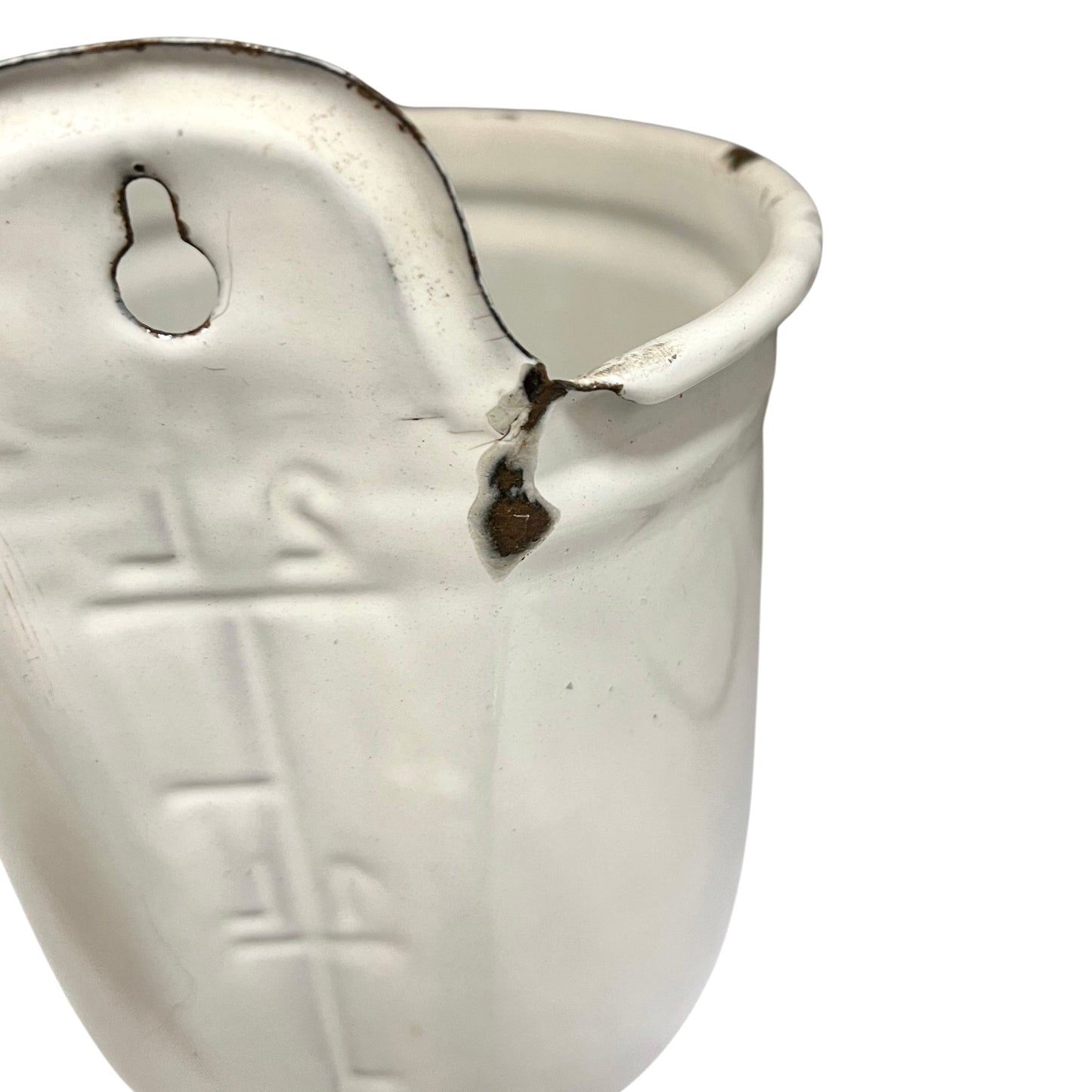 A white  measuring cup with embossed measurement markings and a small hanging loop, shown on a plain white background.