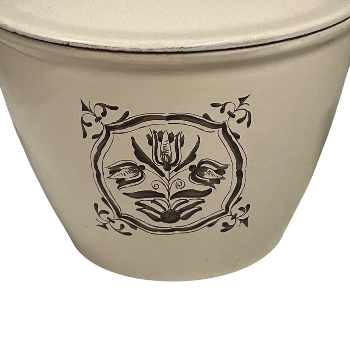 Tulip pattern on a le Creuset pan on a white background 