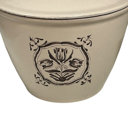 Tulip pattern on a le Creuset pan on a white background 