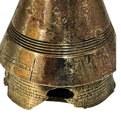WW1 relic brass fuse number 102, ideal as a paperweight n a white background