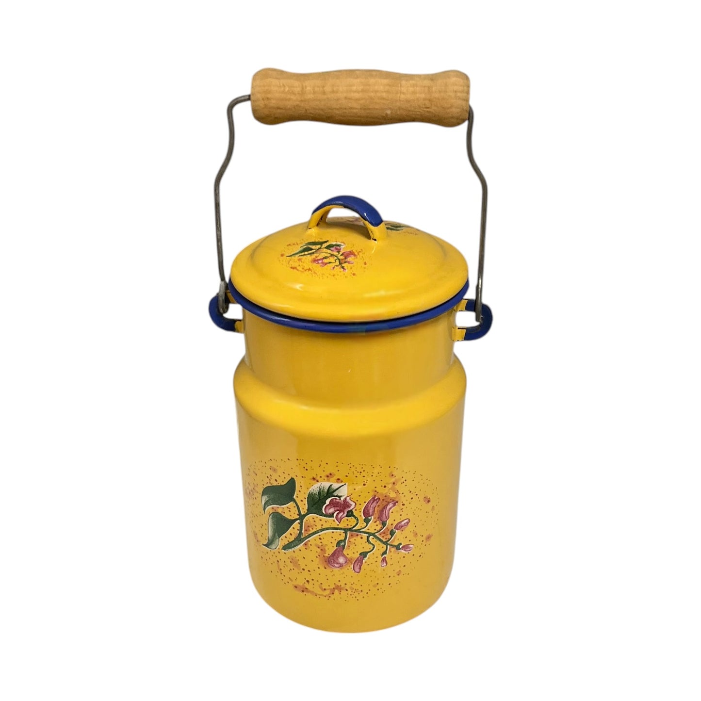 A vintage yellow enamel milk canister with a wooden handle, metal wire frame, blue trim, and a floral print on the front, isolated on a white background.