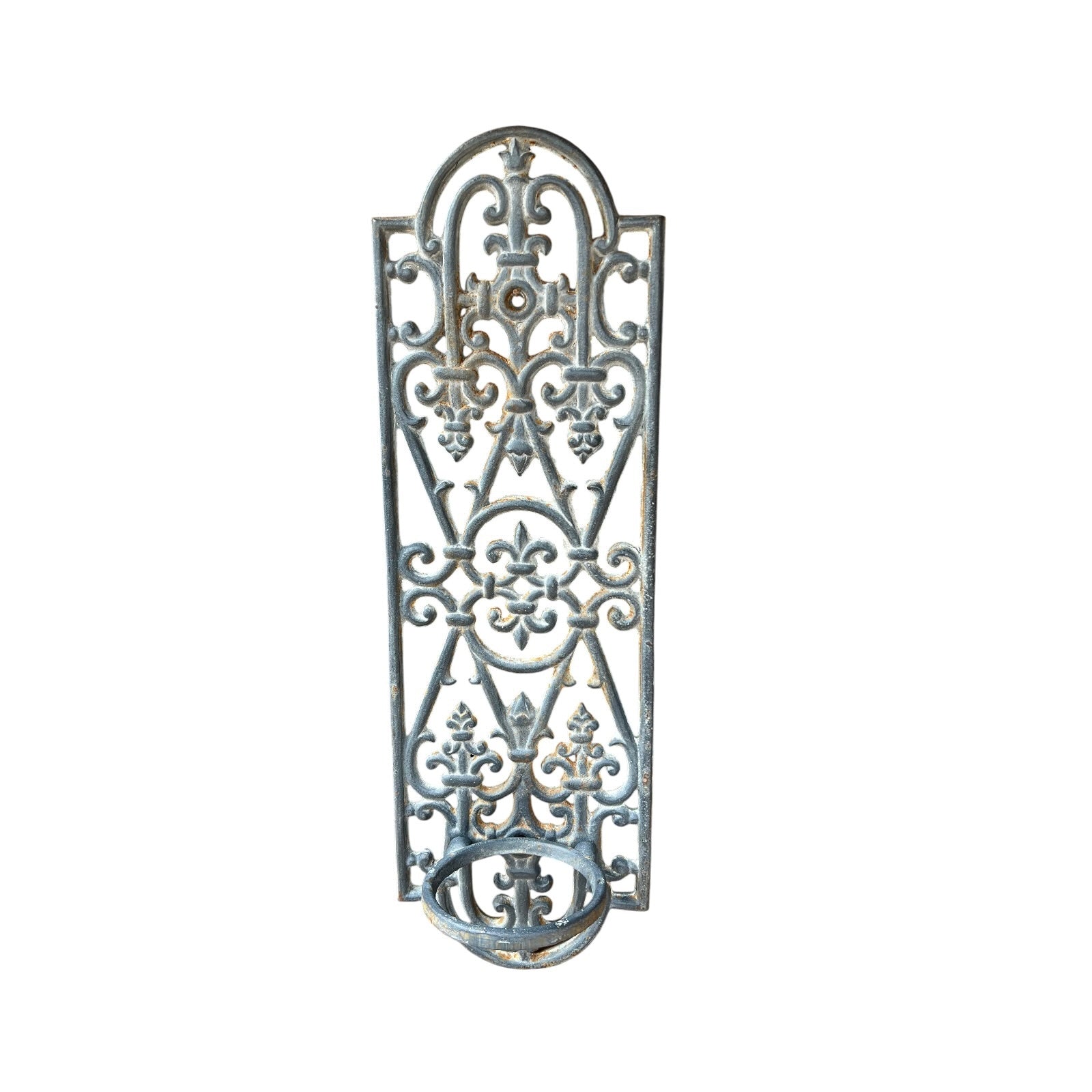 close up of a metal decorative wall planter on a white background