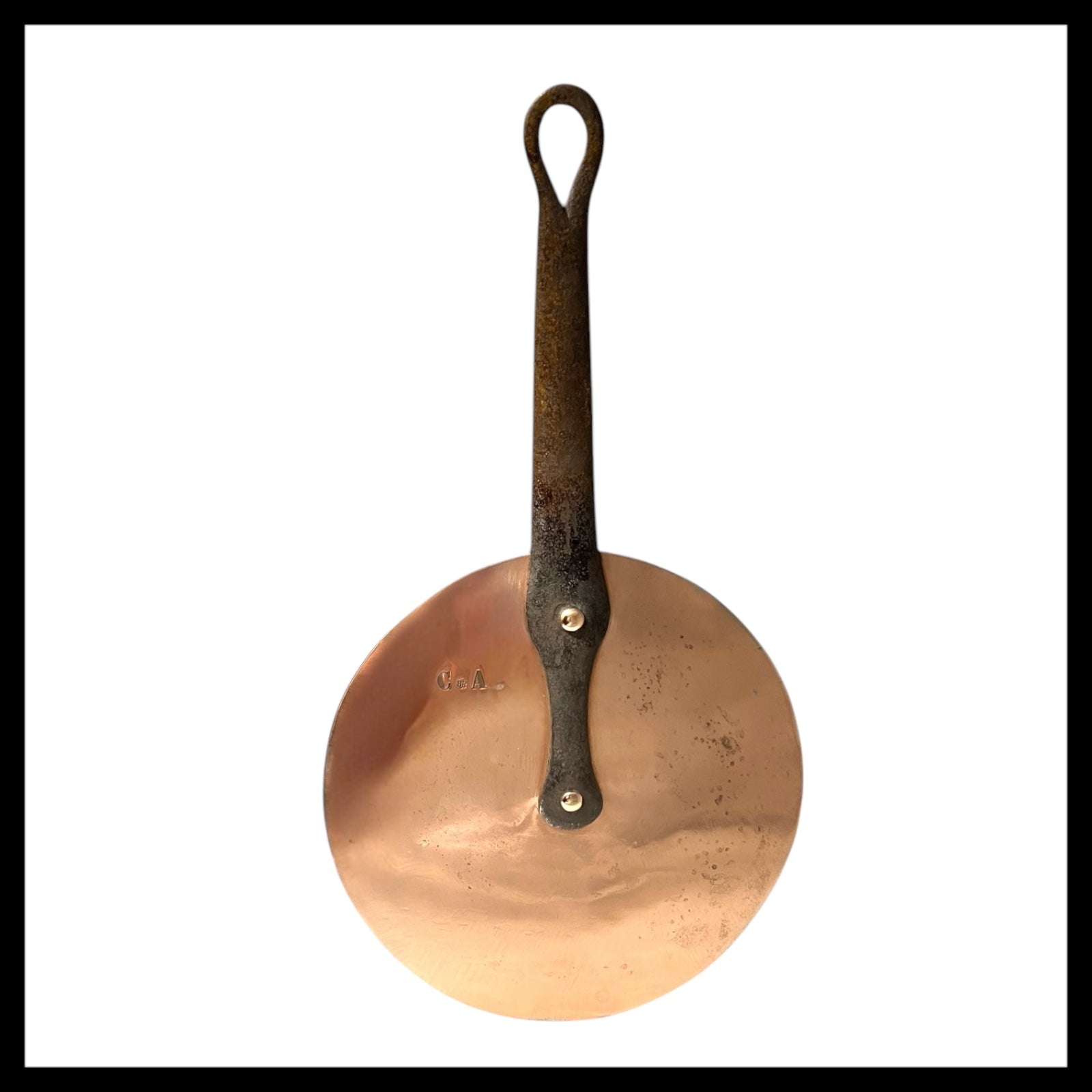 Antique Universal Fit Flat Copper Pan Lid with a cast iron handle and copper rivets