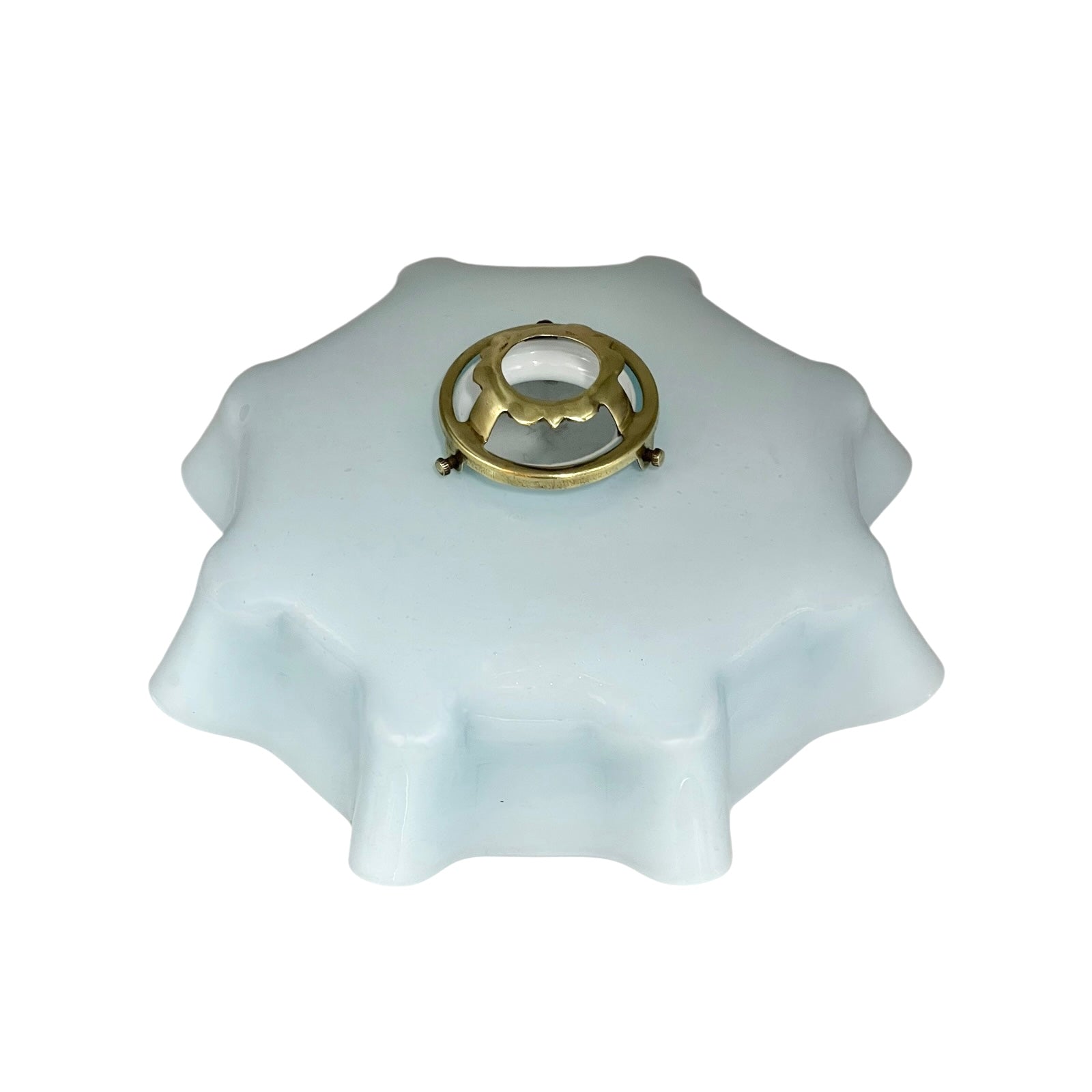 Vintage blue glass lamp shade with brass fitting on a white background