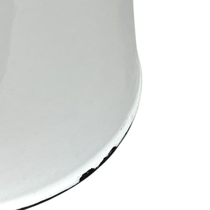 Close up of an enamel coffee pot on a white background