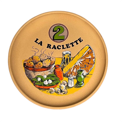 Plate with 'La Raclette' branding, the number 2 and illustrations on a white background
