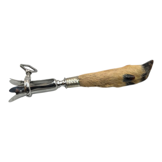 Traditional French vintage gigot with a deer hoof handle on a white background, ideal for a taxidermy collector 