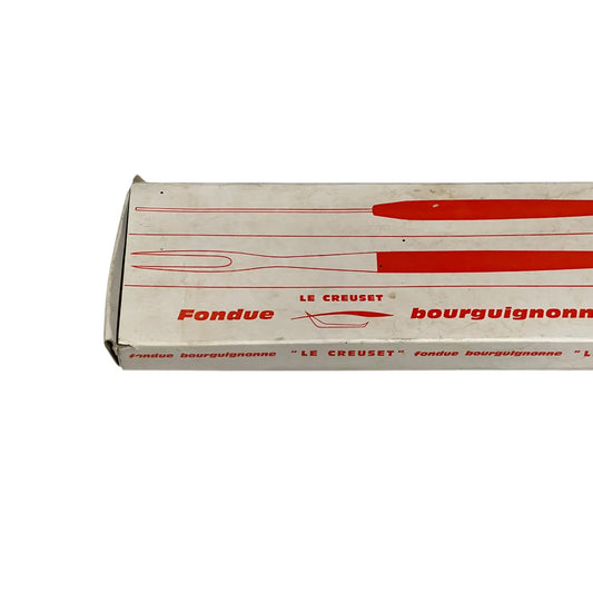 Le Creuset fondue bourguignonne packaging on a white background
