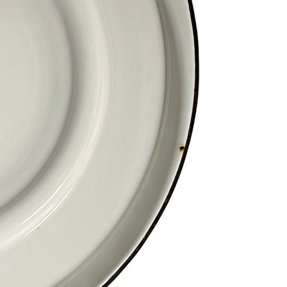 Close up of a vintage enamel lidded white bucket on a white background