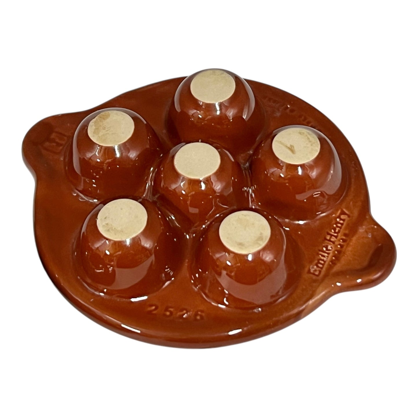 Brown ceramic egg ,snail, or escargots plates with multiple compartments on a white background