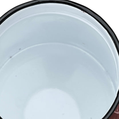 Close-up of a red teapot on a white background