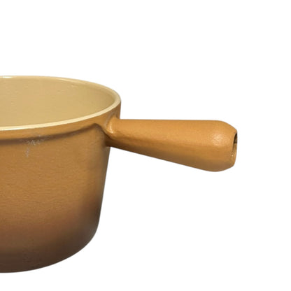 Close up of Le Creuset pan on a white background