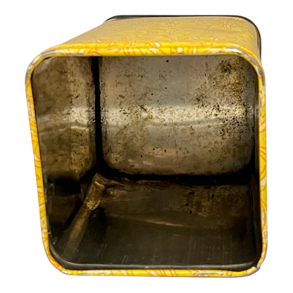 Vintage metal can with yellow lid on a white background