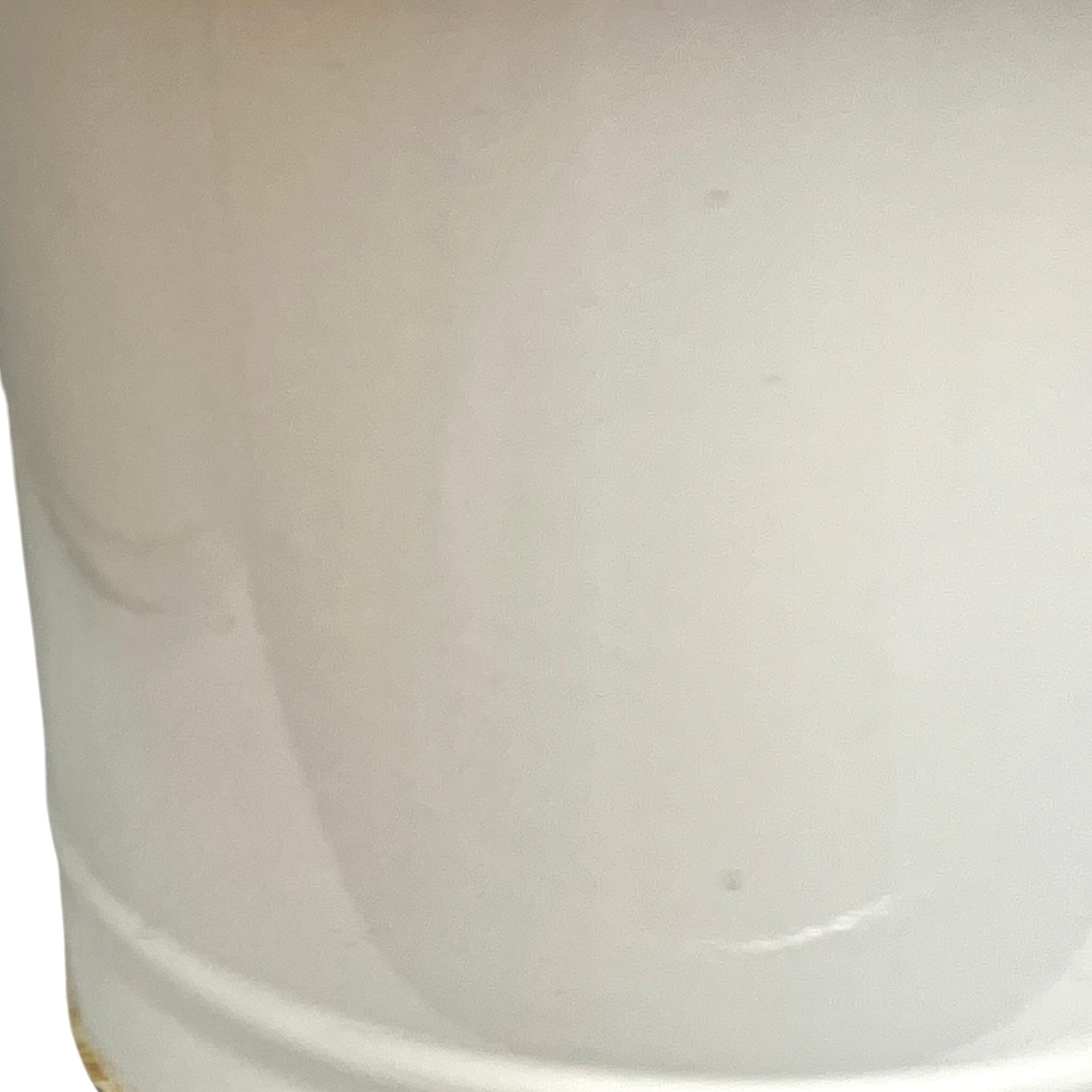 Close up of a vintage enamel lidded white bucket on a white background