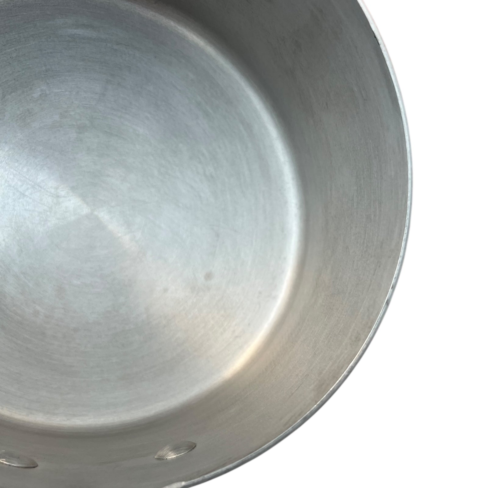 rim of aluminium lined copper pan