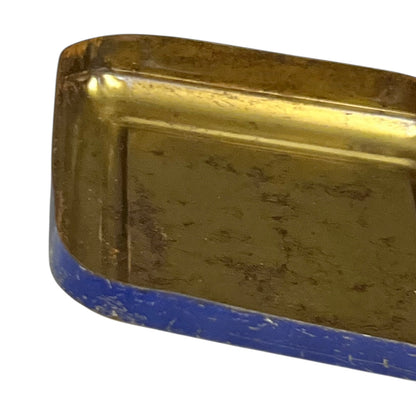 Gold bar with blue base on a white background